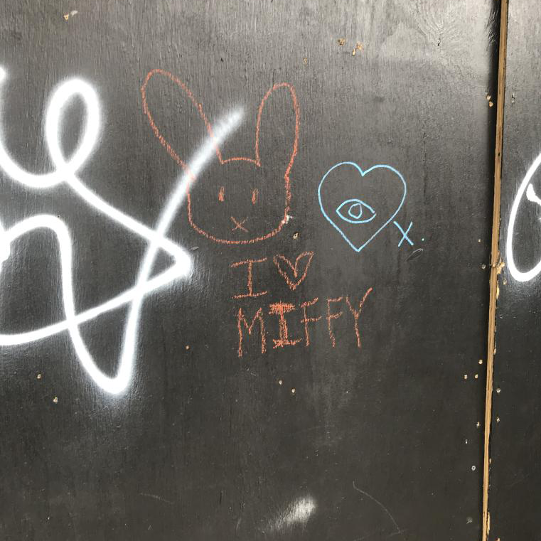 a red chalk drawing of miffy the bunny with the text I LOVE MIFFY